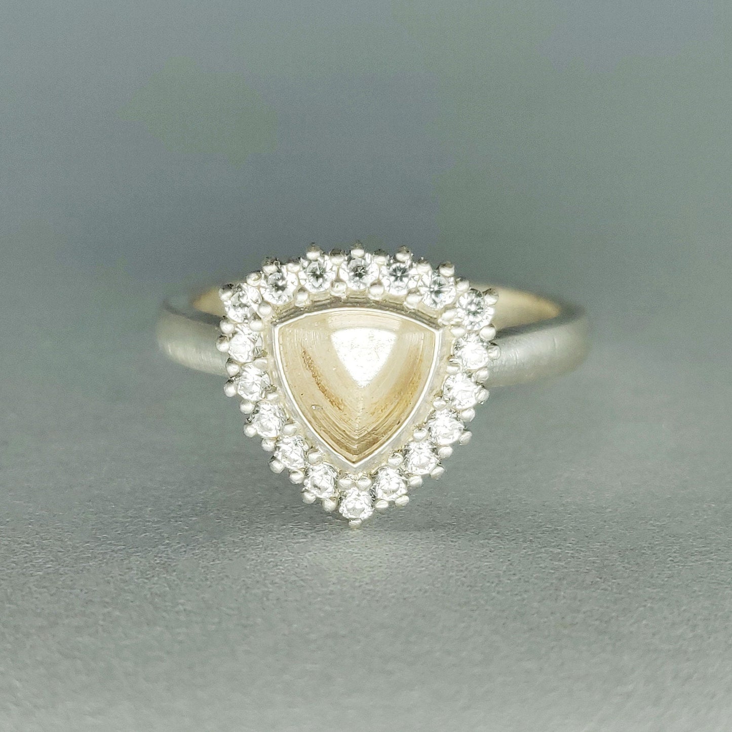 Elegant Trillion Cut Silver Halo Ring with Pave Cubic Zirconia Cluster