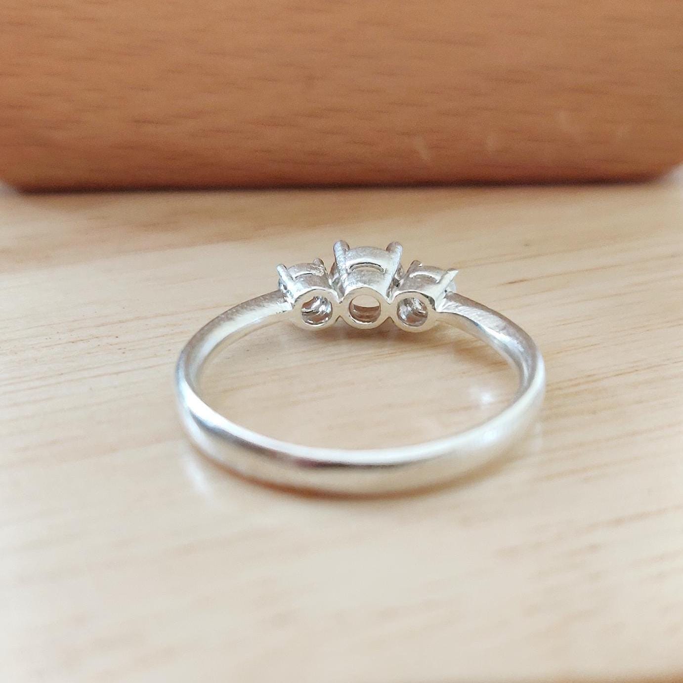 Rear view of a 3 stone ring blank from behind.