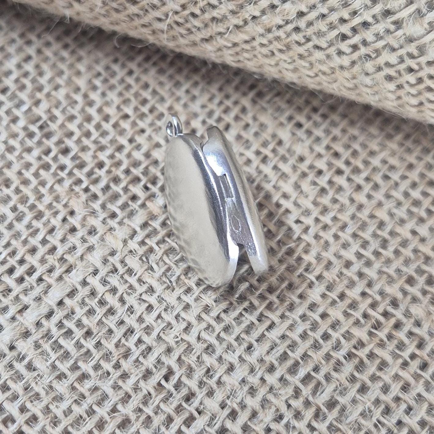 Rear View of a Oval Silver Locket.