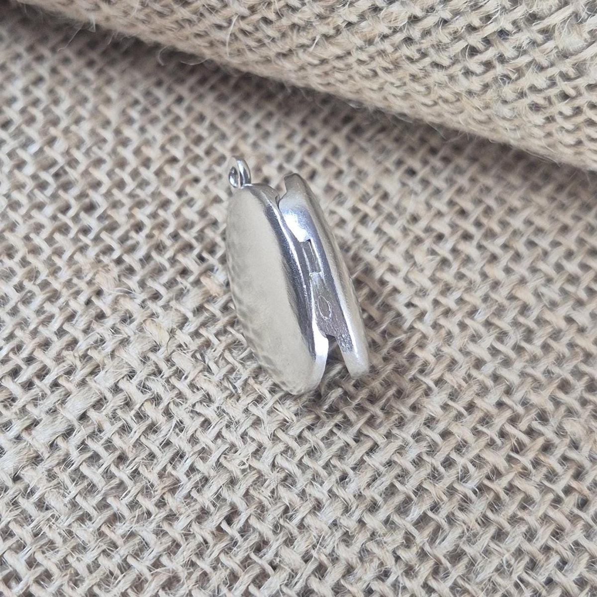 Rear View of a Oval Silver Locket.
