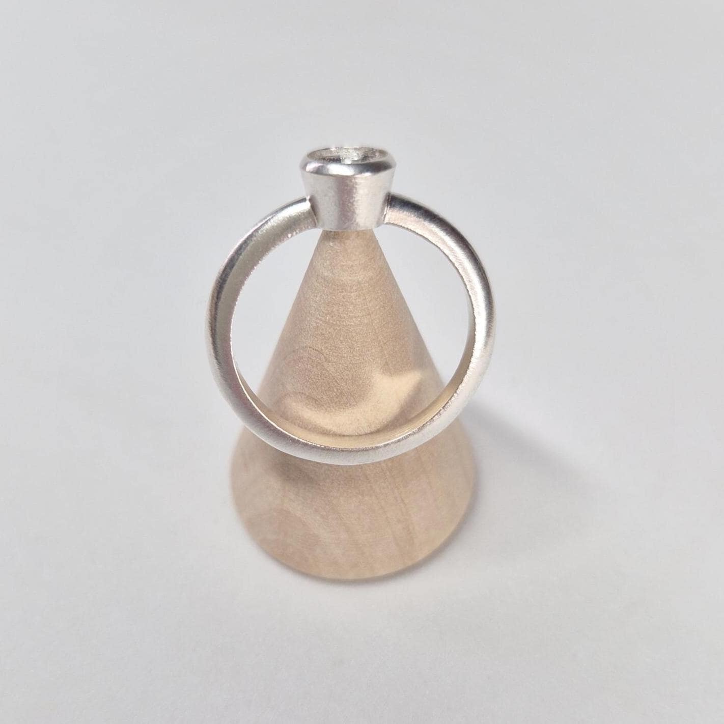 Silver Ring Blank on a Wooden Cone