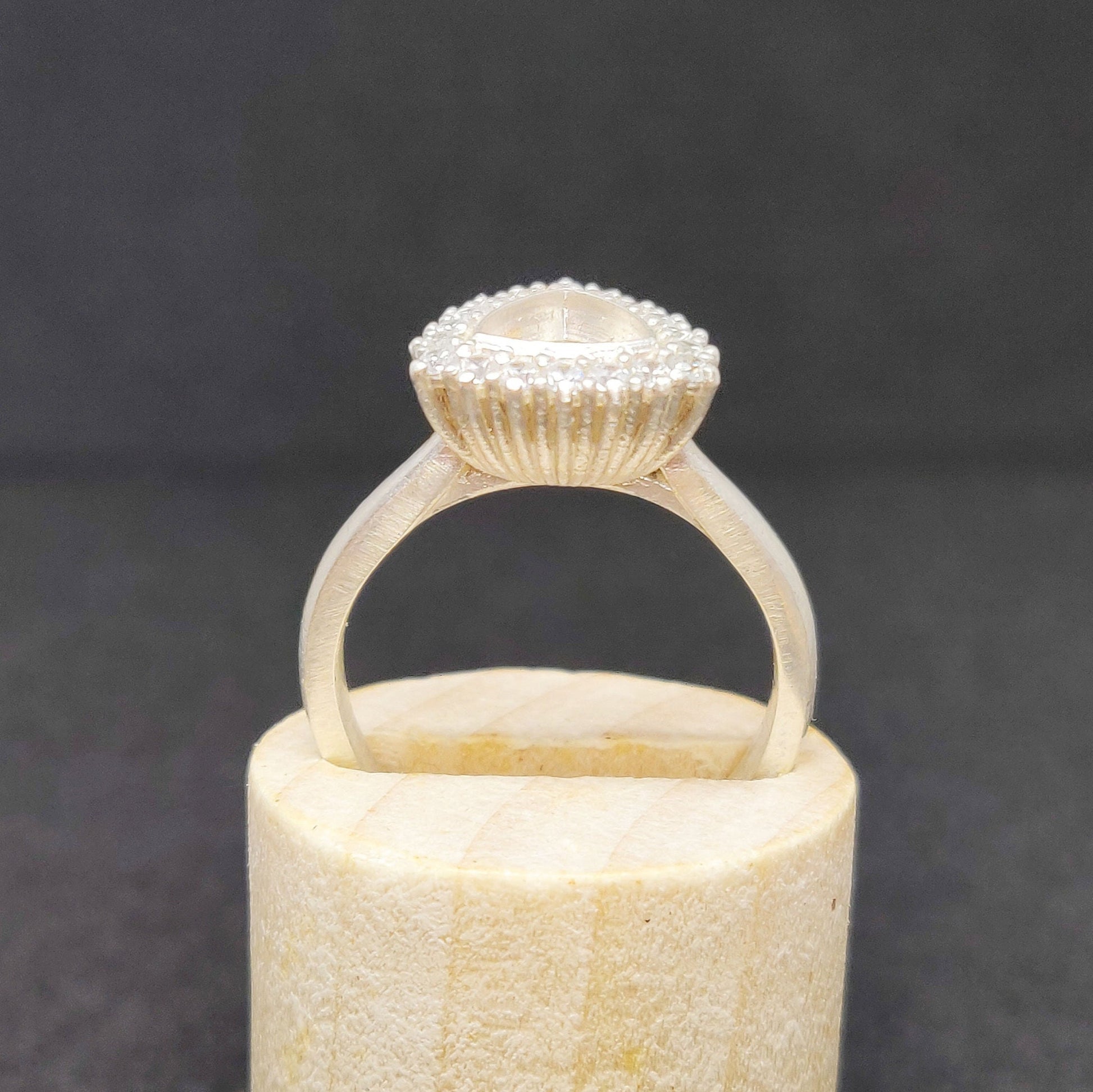Elegant Trillion Cut Silver Halo Ring with Pave Cubic Zirconia Cluster