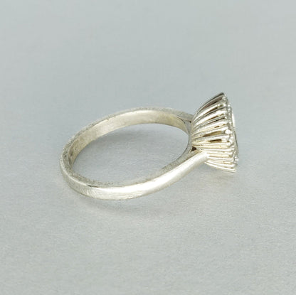Elegant Trillion Cut Silver Halo Ring with Pave Cubic Zirconia Cluster