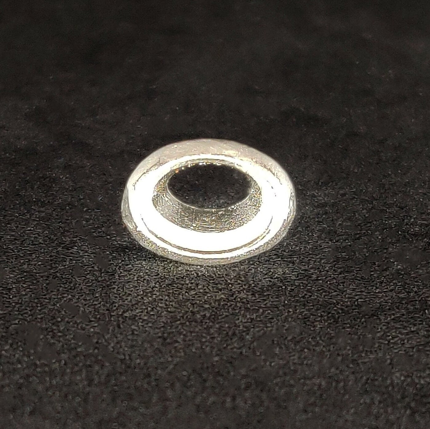 7x5mm Silver Oval Cut Gemstone Rubover Setting