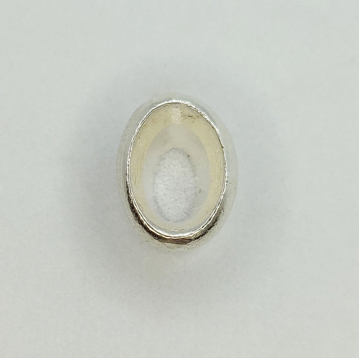 7x5mm Silver Oval Cut Gemstone Rubover Setting