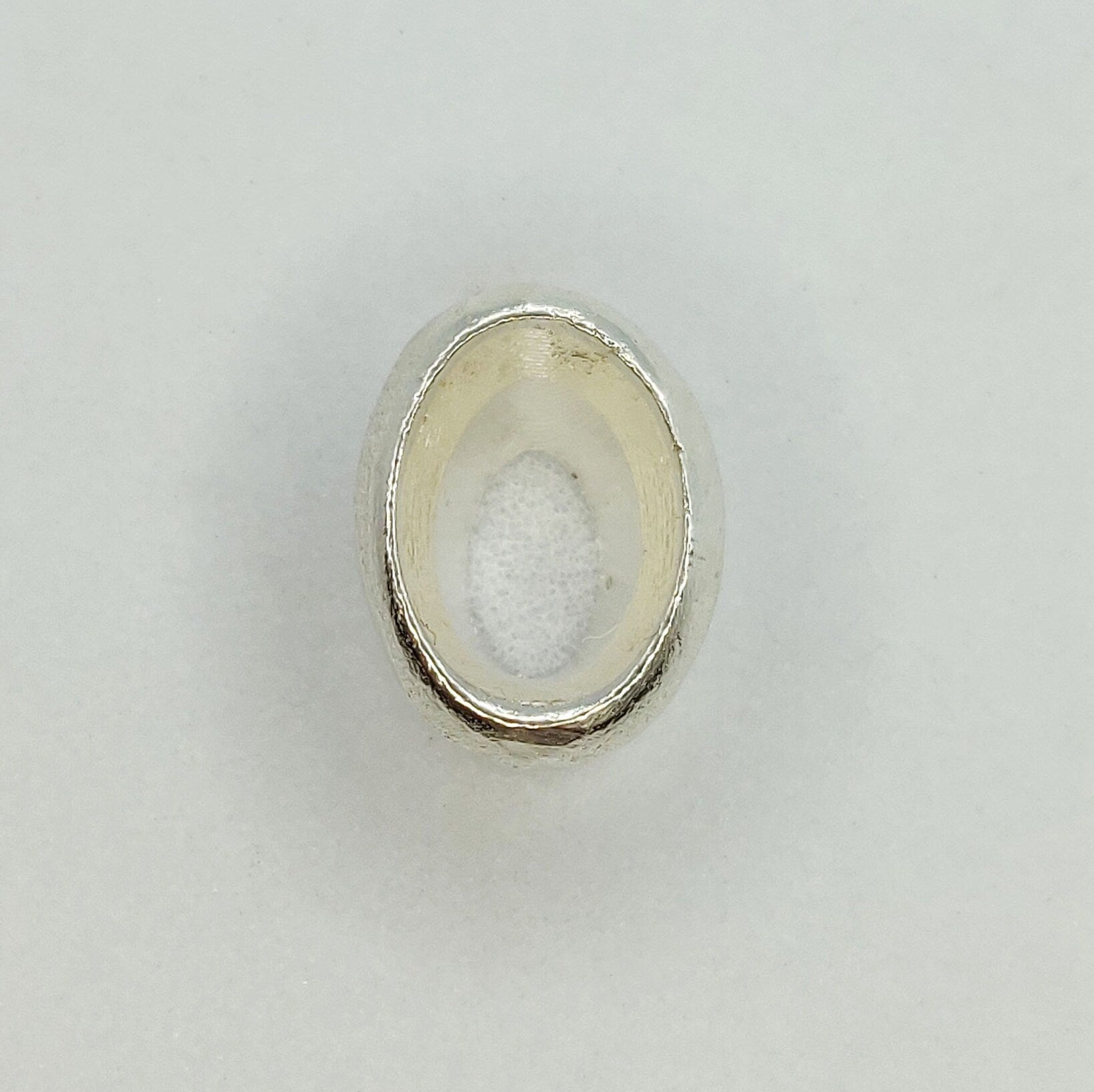 7x5mm Silver Oval Cut Gemstone Rubover Setting