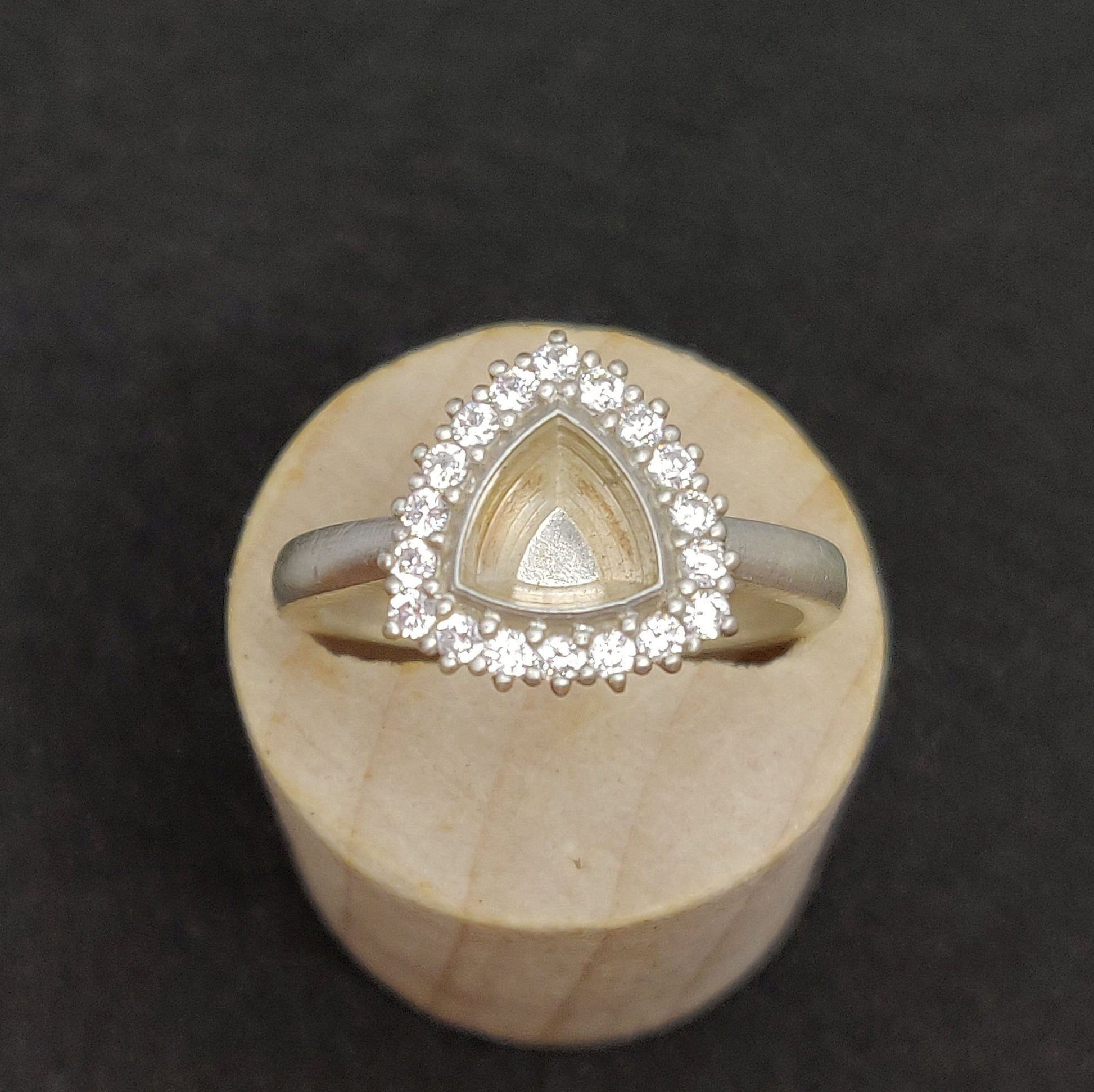 Elegant Trillion Cut Silver Halo Ring with Pave Cubic Zirconia Cluster