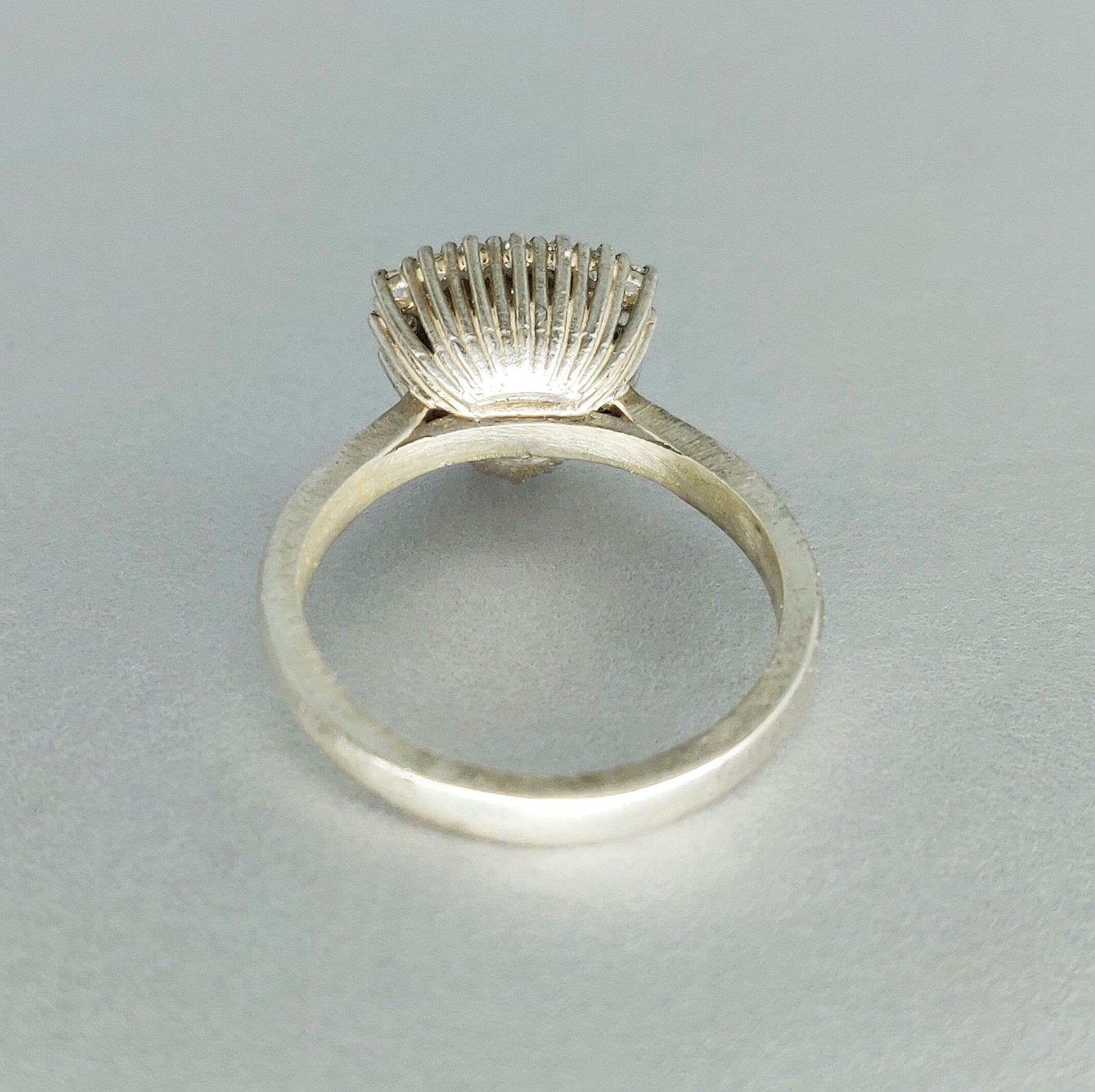 Elegant Trillion Cut Silver Halo Ring with Pave Cubic Zirconia Cluster