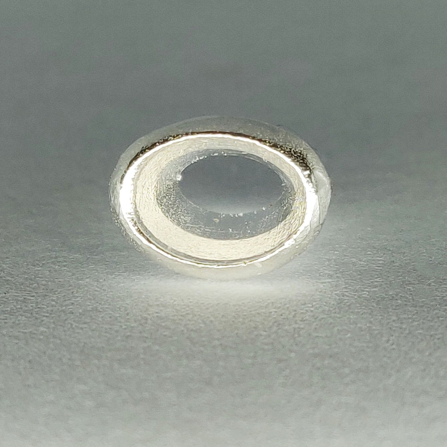 7x5mm Silver Oval Cut Gemstone Rubover Setting