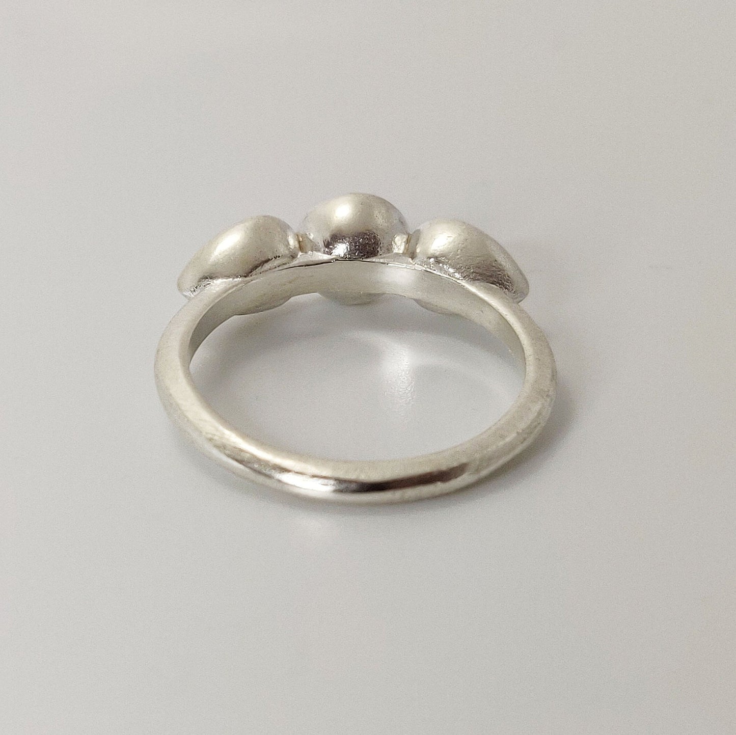 3 Stone Silver Cup Bezel Ring With Pear and Round Settings