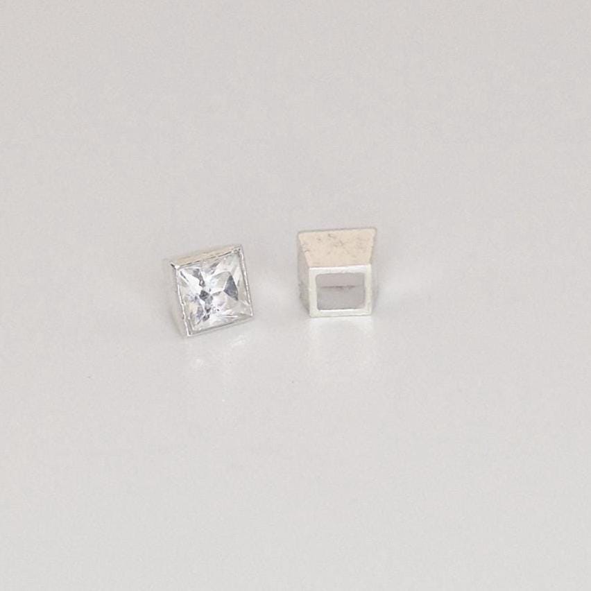 Top view of square bezel setting showing clean seat and polished outer walls