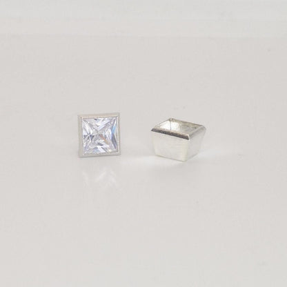 Princess cut square gemstone with 7mm sterling silver bezel setting cup, open and closed views.