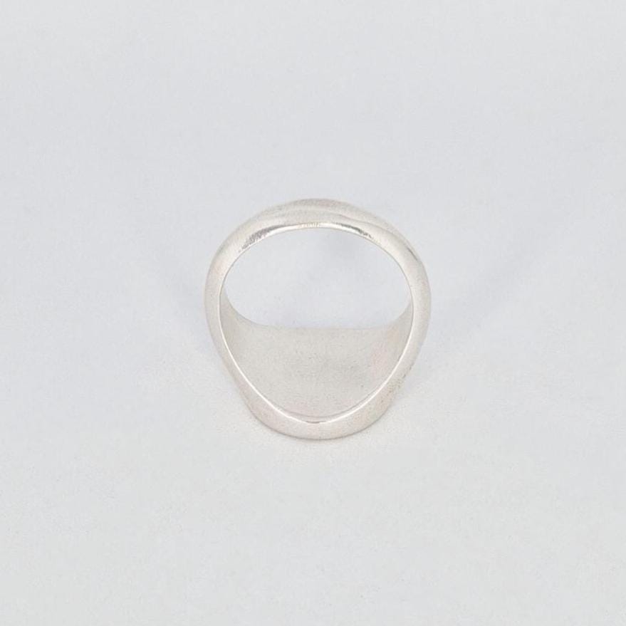 Sterling silver signet ring underside view, wide band and solid construction