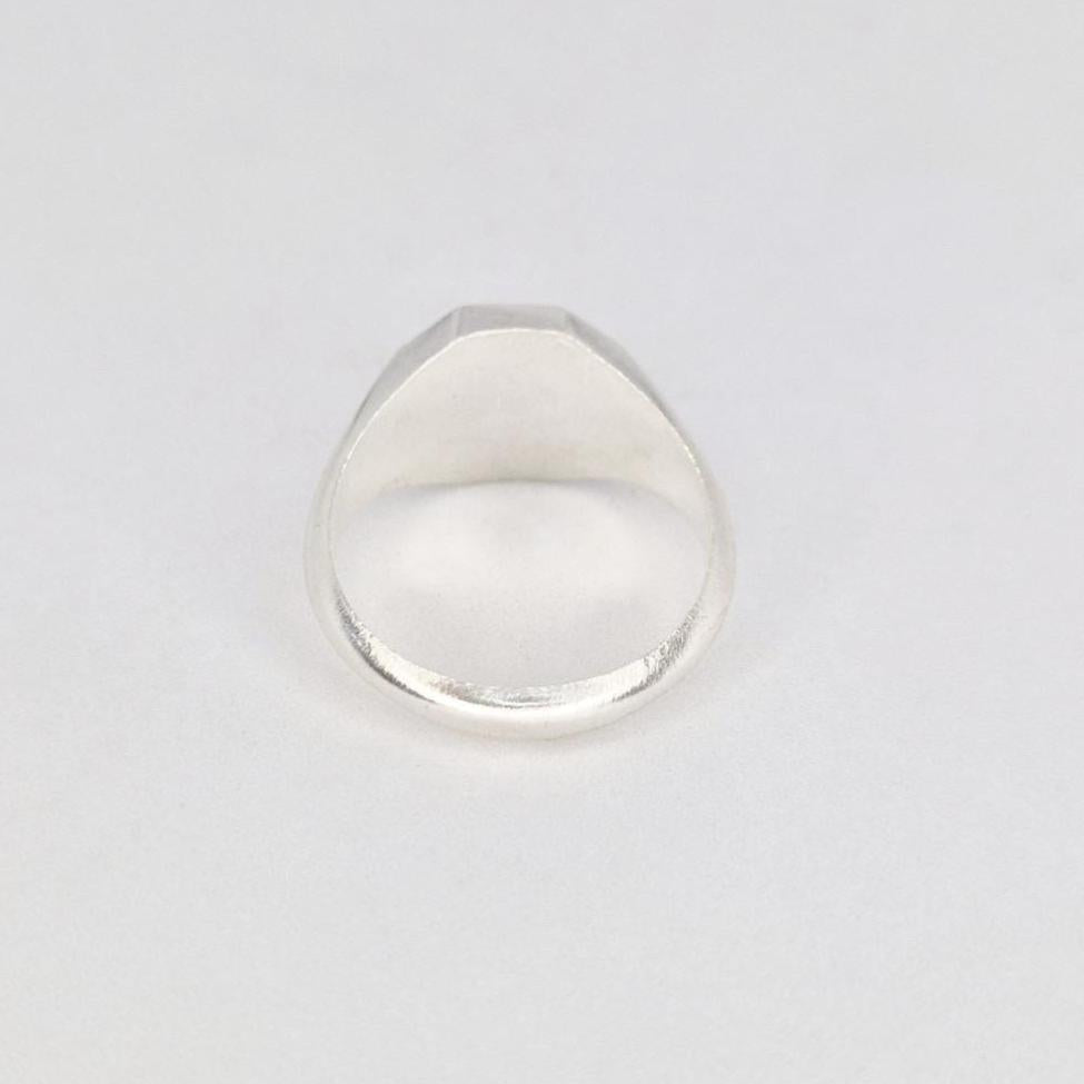 Back view of signet ring blank showing band shape and internal finish, solid silver jewellery component