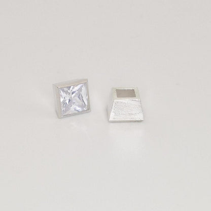 7mm square bezel cup setting in sterling silver with princess cut stone, side view of tapered setting.