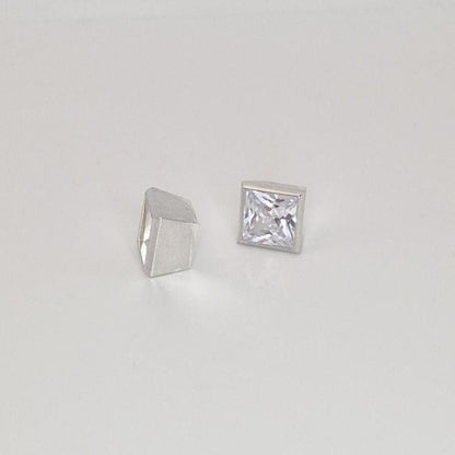 8mm square bezel setting in sterling silver with princess cut stone and side profile of tapered setting.