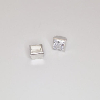 Princess cut square gemstone in 8mm sterling silver bezel setting with open cup shown alongside.
