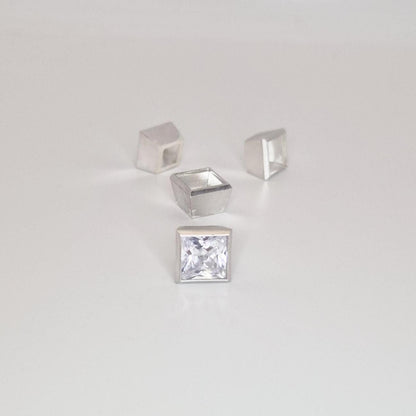 8mm square bezel settings in sterling silver with gemstone and multiple unfinished setting cups.