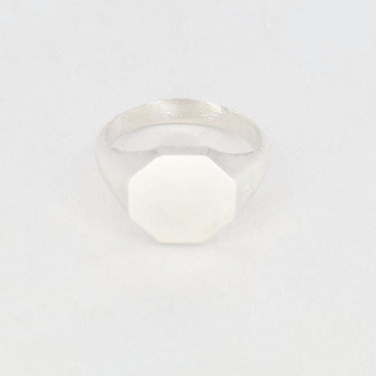 Front view of octagonal signet ring blank with flat face for engraving, minimalist silver ring design