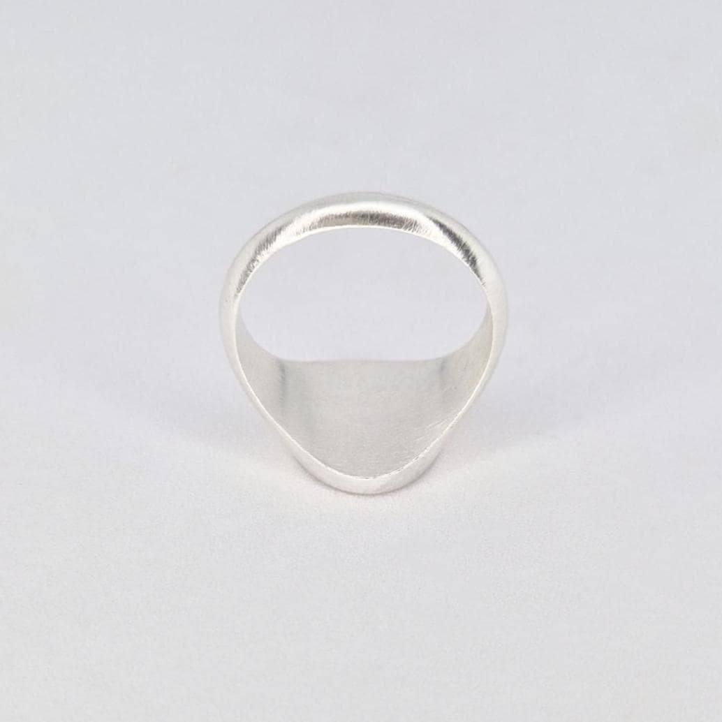 Front view of oval signet ring band in sterling or Argentium silver with smooth interior