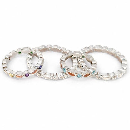 Four Argentium silver birthstone rings with coloured gemstones and marquise bezel settings for memorial resin.