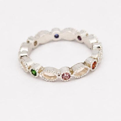 Single Argentium silver birthstone ring with coloured gemstones and marquise bezel settings for memorial resin.